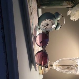 Loft sunglasses in smoky green cat-eye style.